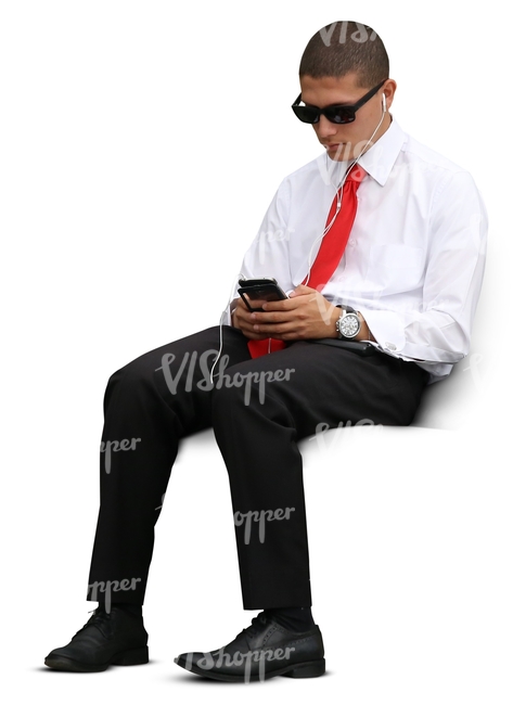 cut out businessman sitting and looking at his phone