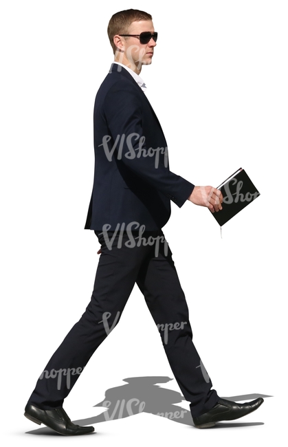 cut out businessman with a black suit walking