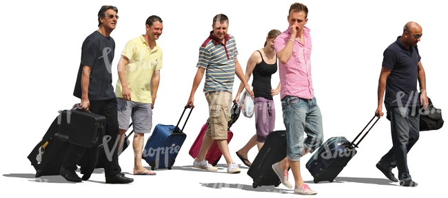 group of people with suitcases walking