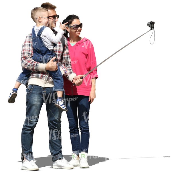 family standing and taking a selfie