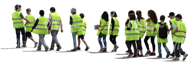 group of students wearing reflector vests walking in line