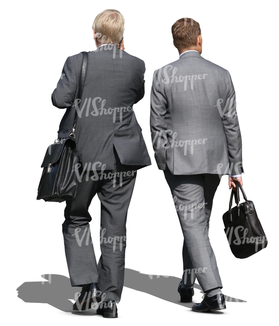 two cut out businessmen walking side by side