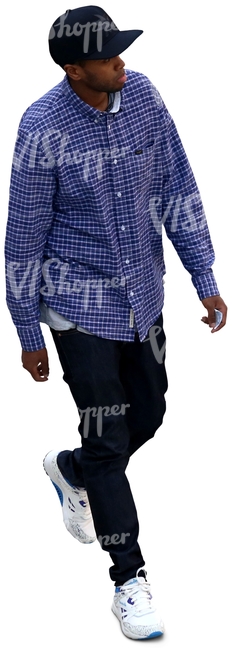 man with a plaid shirt walking