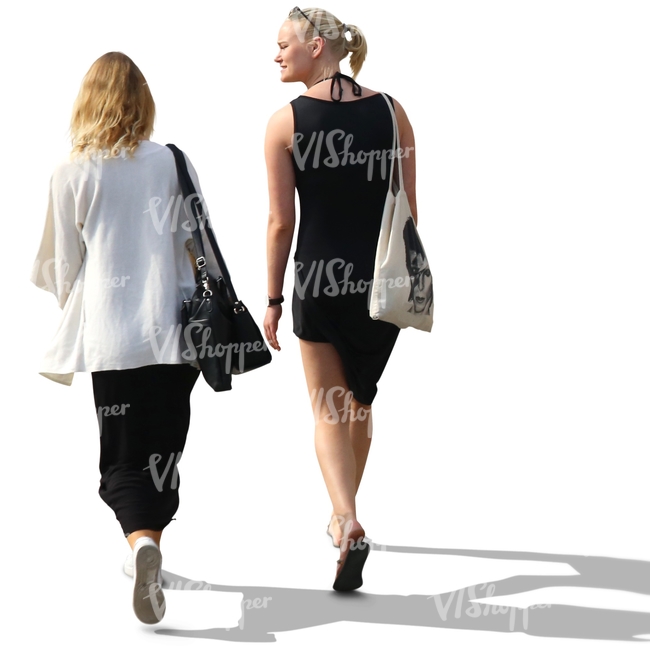 two women with blond hair walking and talking