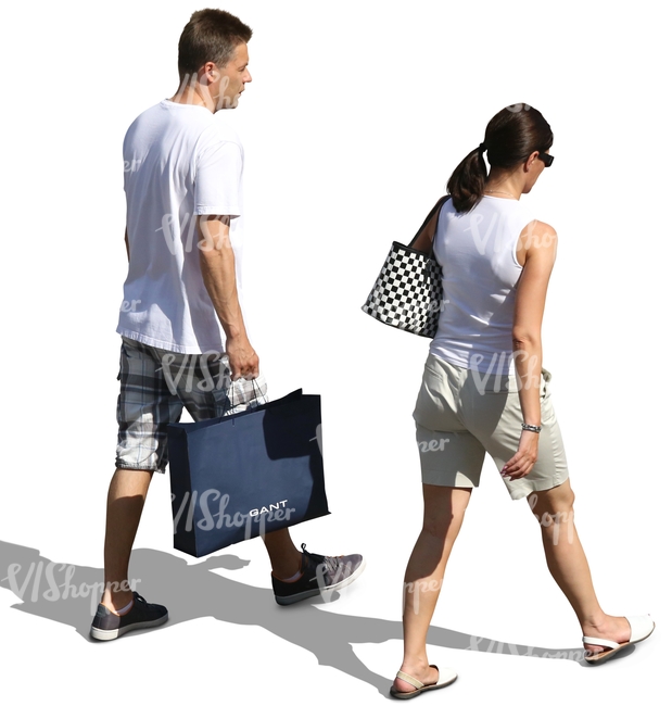 man and woman in light summer clothing walking