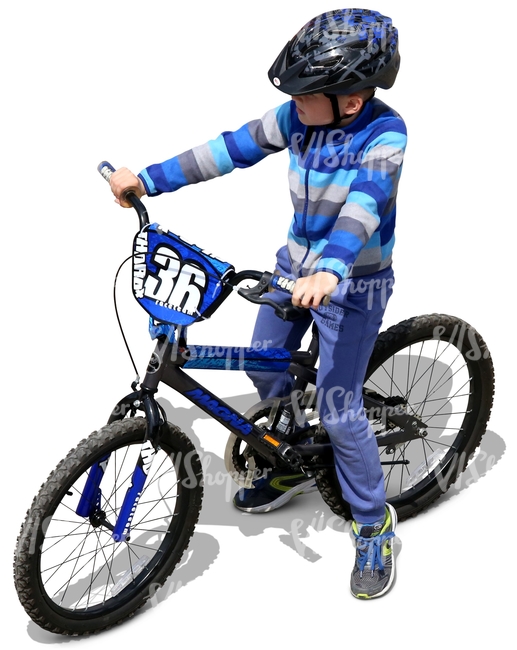 boy with a helmet riding a bike