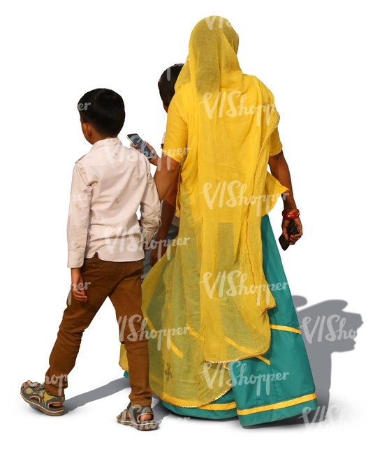 hindu woman wearing a sari walking with her two sons