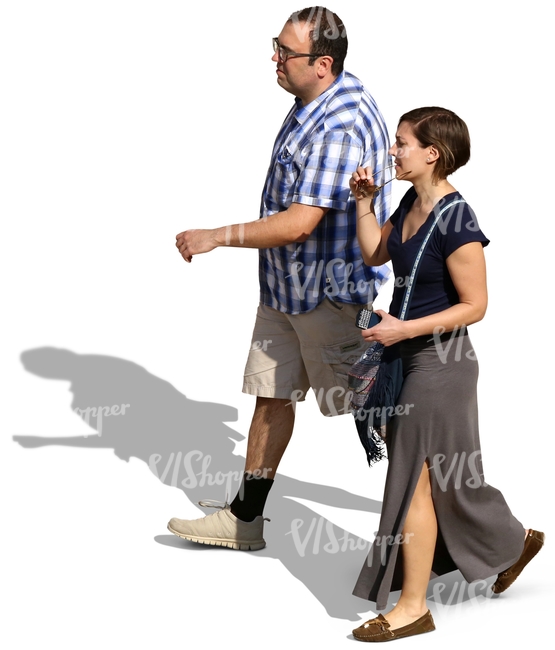 a couple in summer clothing walking