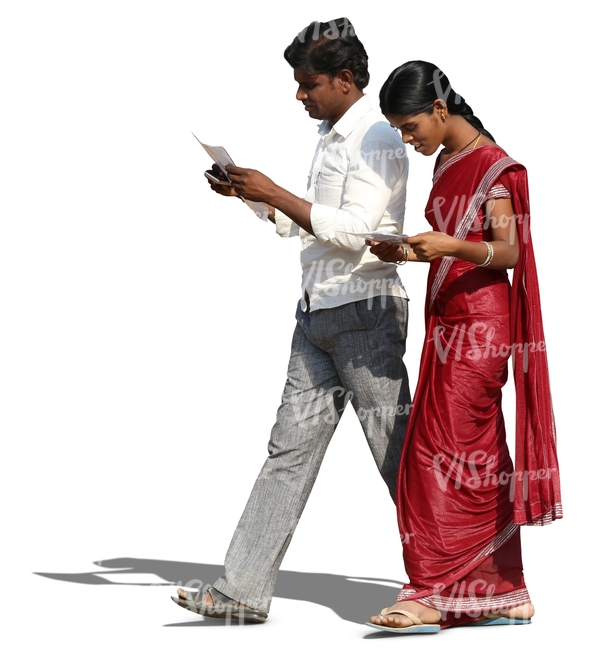 indian man and woman walking and reading something