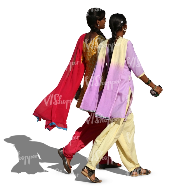 two hindu women wearing colorful indian clothing walking and talking