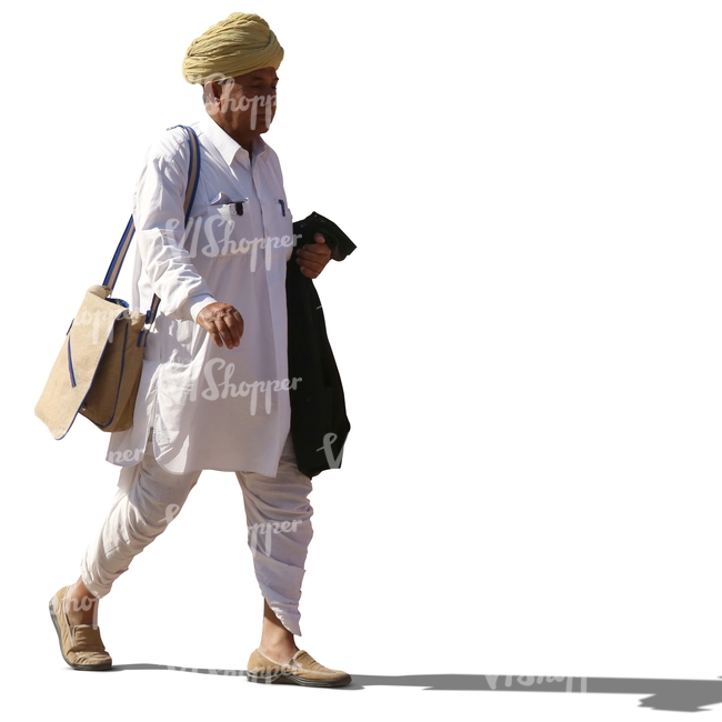 hindu man with a turban wearing ethnical indian attire walking