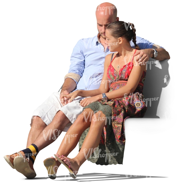 couple sitting and holding hands in summer