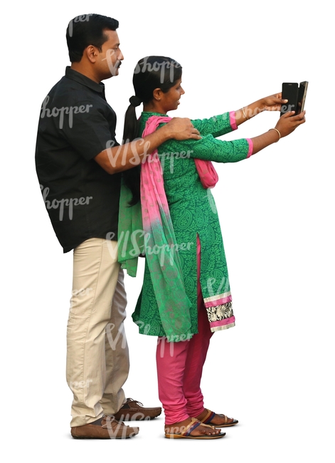 indian couple standing and taking a selfie