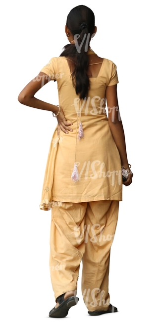 hindu woman in a yellow salwar kameez standing
