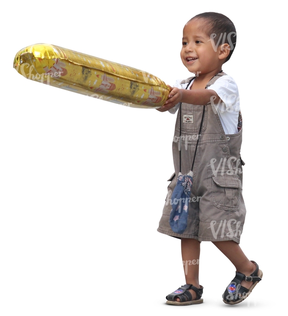 small latino boy with a toy walking