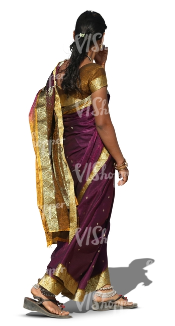 hindu woman wearing a sari walking