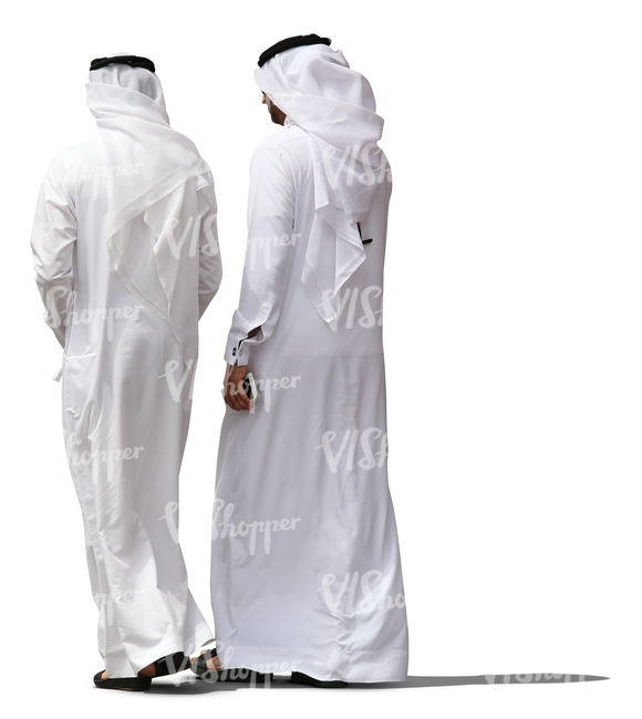 two arab man wearing dishdashas walking