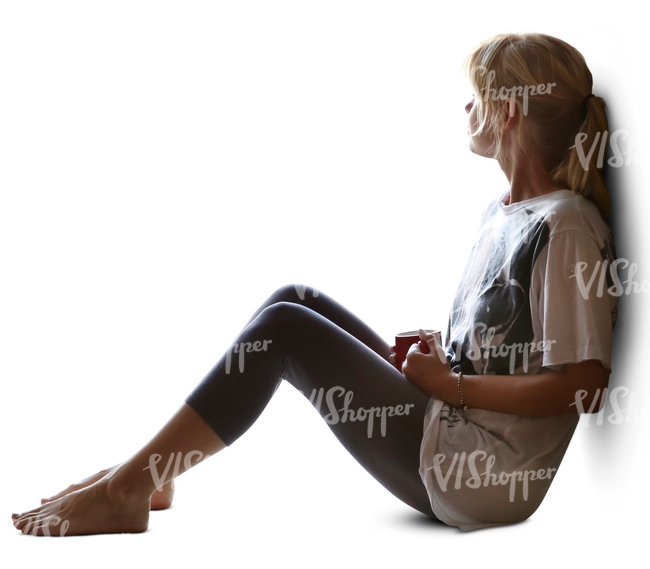 woman sitting on a window sill