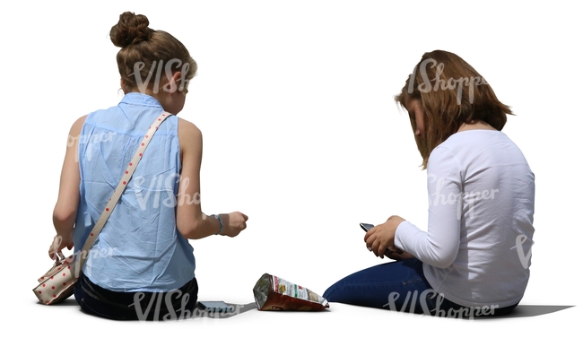 two teenage girls sitting