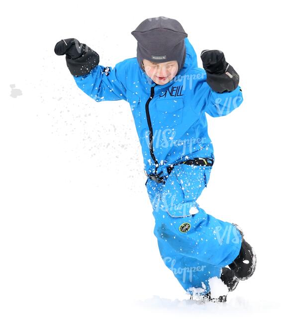 young boy playing in the snow