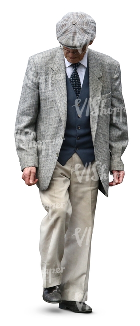 elderly man in an elegant grey suit walking