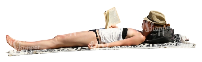 woman sunbathing and reading a book