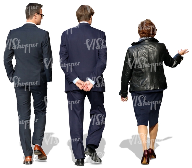 woman and two men in suits walking and talking