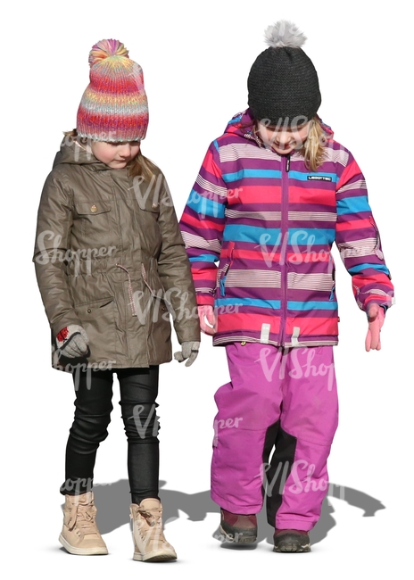 two young girls walking in autumn