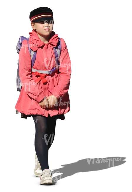 schoolgirl in a pink coat walking