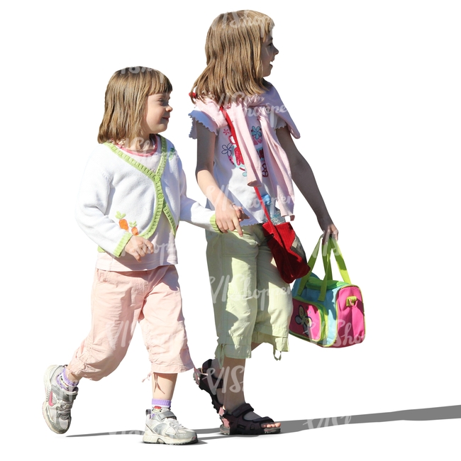 two little girls walking hand in hand