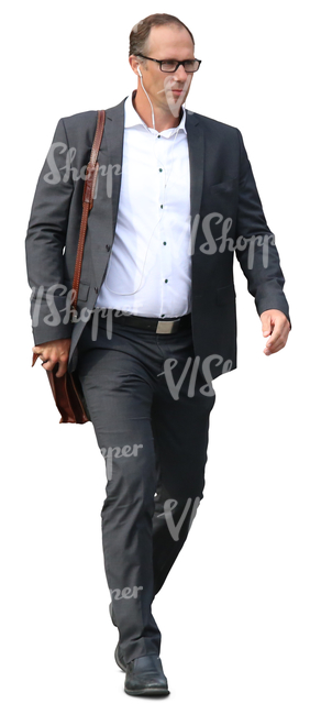 businessman with headphones walking