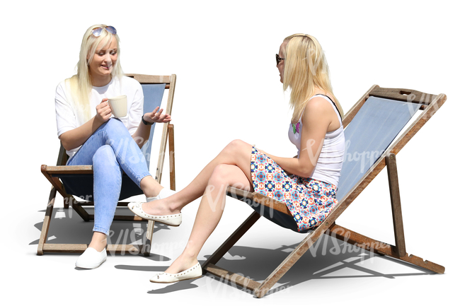 two women sitting on sling chairs and drinking coffee