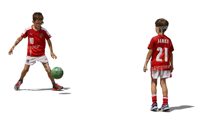 two young boys playing football