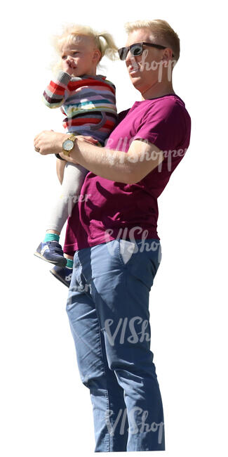 man standing and holding his daughter in his arms