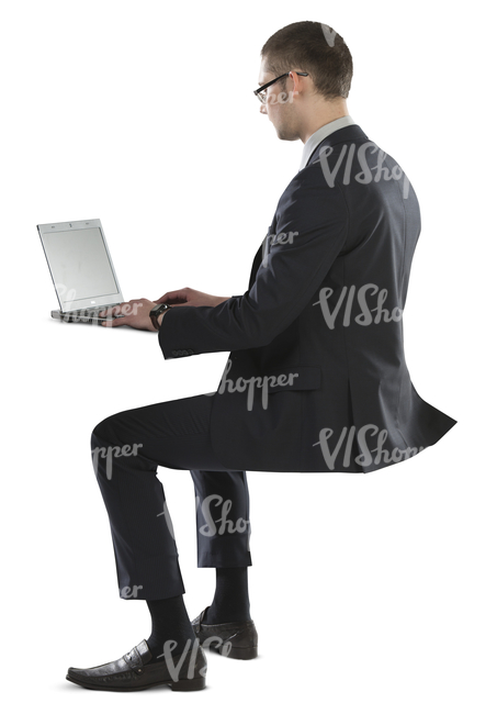 young businessman sitting and working with his laptop