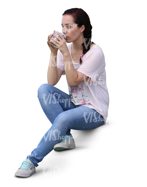 woman sitting on the stairs and drinking coffee