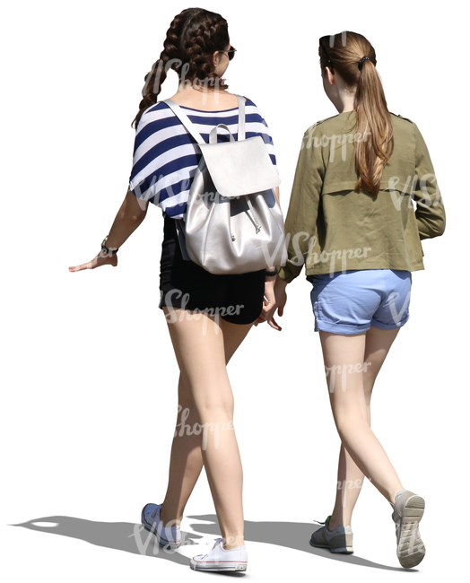 two teenage girls walking and talking