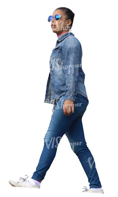 black woman in denim clothing walking seen from below