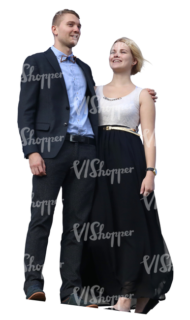 couple in formal wear standing on a balcony