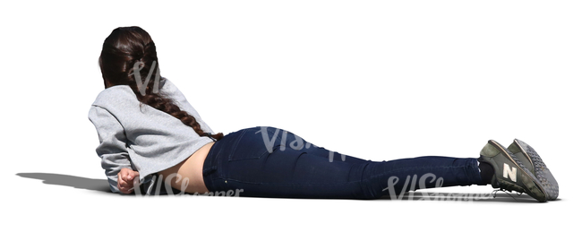 young woman lying on the ground