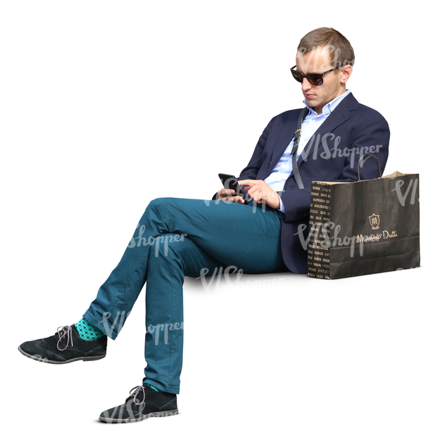 man with a shopping bag sitting on the bench