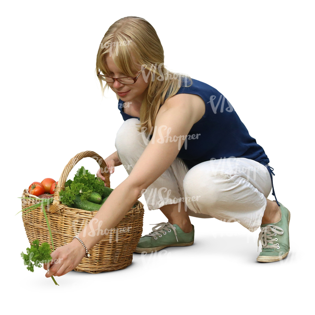 cut out woman picking herbs in the garden