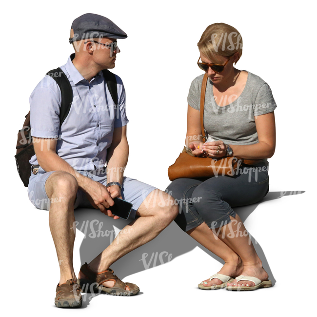man and woman sitting together on a bench