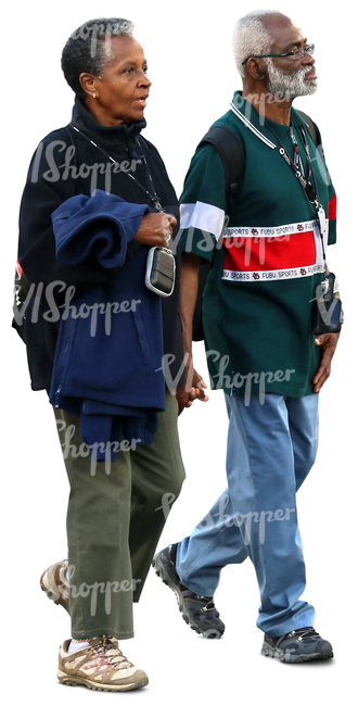 elderly black couple walking hand in hand