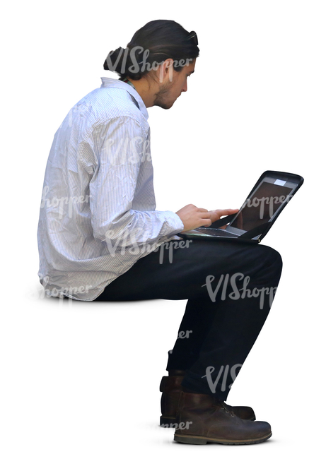 man sitting and working on his laptop