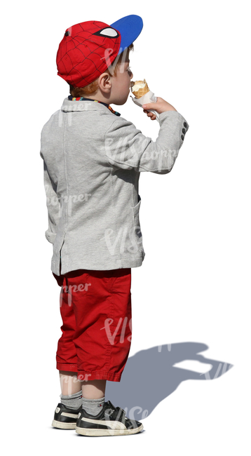 boy with a red cap eating ice cream