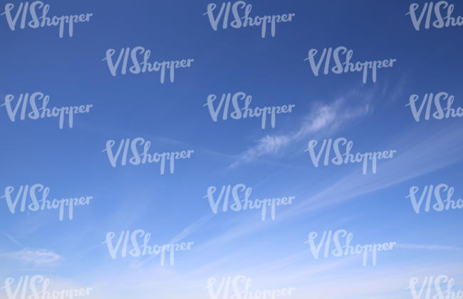 blue sky with thin cloud stripes