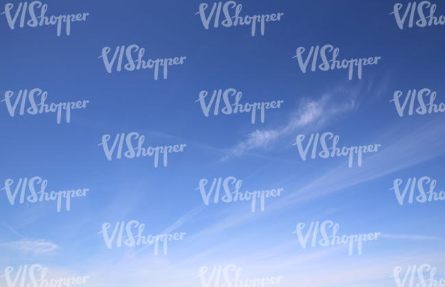 blue sky with thin cloud stripes