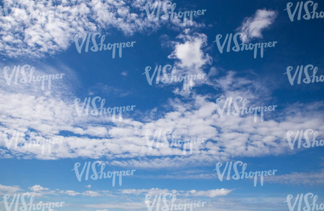 daytime sky with scattered clouds