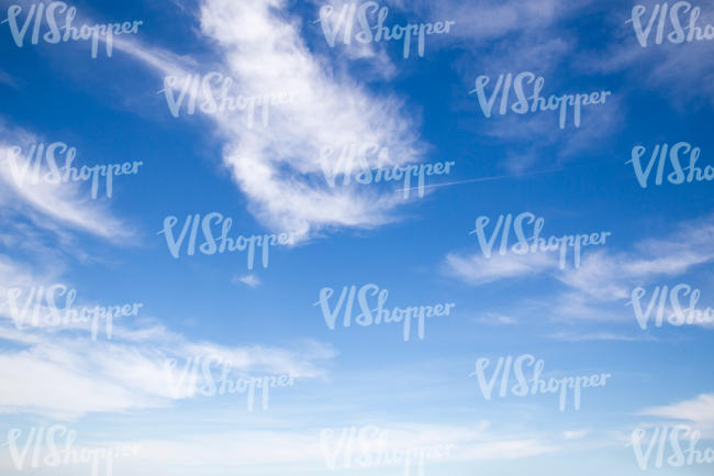 deep blue sky with few clouds